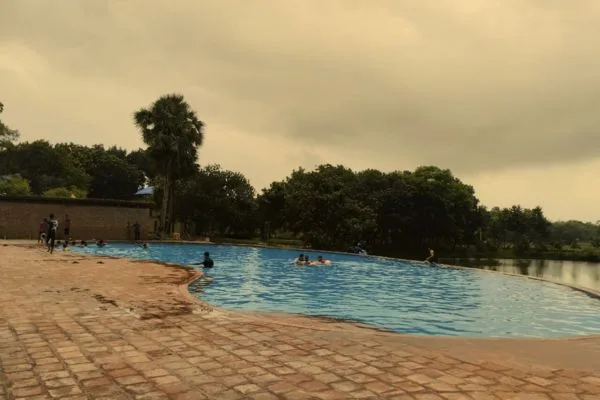 Swimming pool at dusk at Matir Maya Eco Resort, Sreepur, Gazipur
