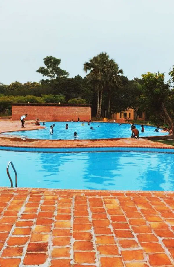 Brick deck beside the swimming pool at the eco resort in Gazipur